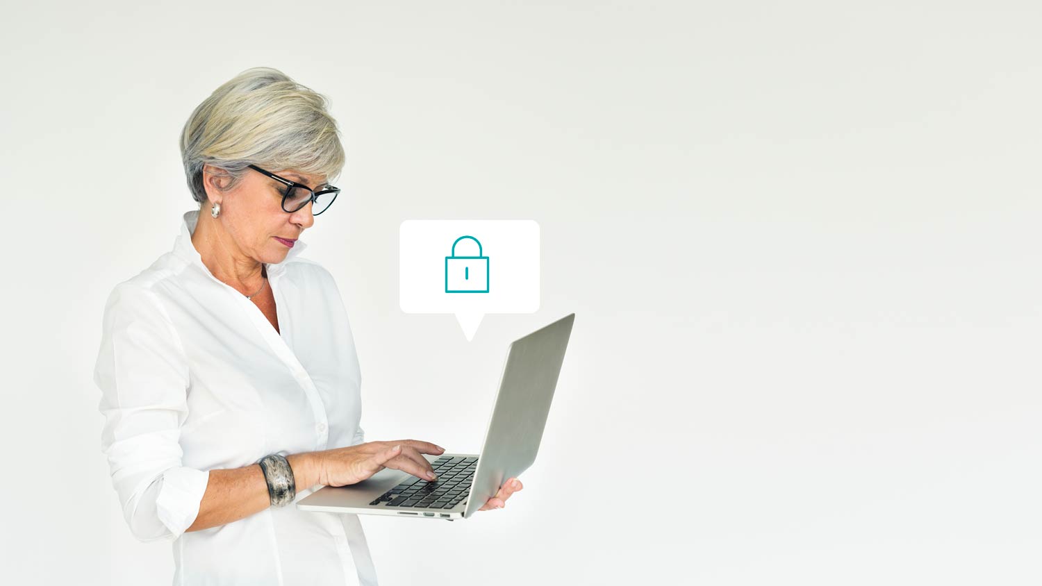 Elderly woman using a laptop